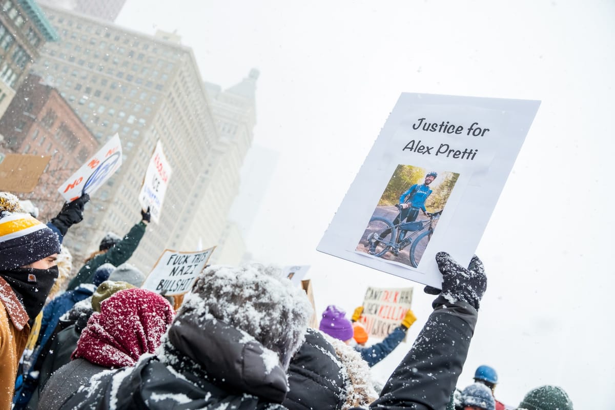 Snow-covered protesters in Chicago demand justice for Alex Pretti. 